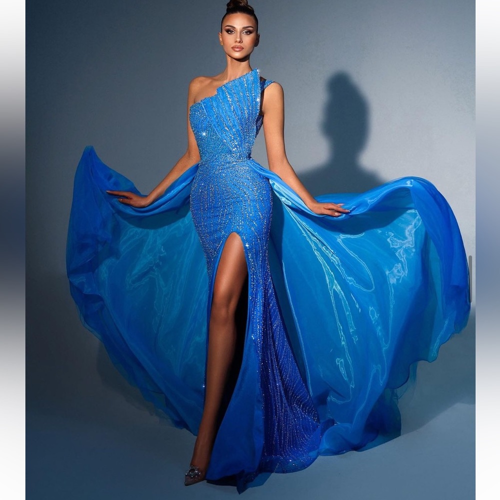 Couture sequin mermaid gown with over skirt